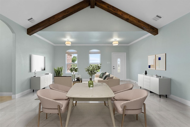 dining room featuring beamed ceiling