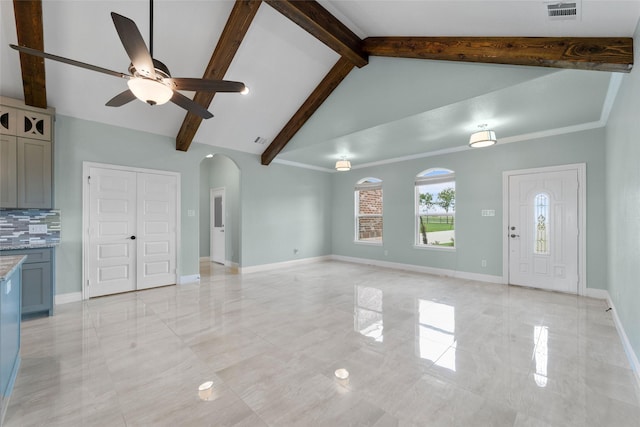 unfurnished living room featuring beam ceiling, ceiling fan, and high vaulted ceiling