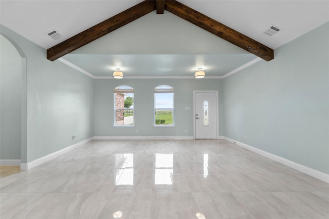 unfurnished living room with beam ceiling