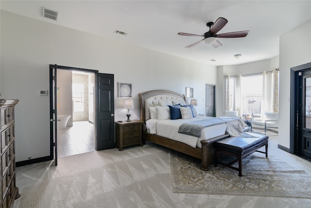 bedroom with ceiling fan and light colored carpet