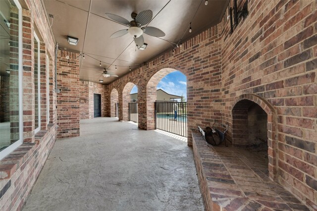 property entrance featuring ceiling fan and covered porch