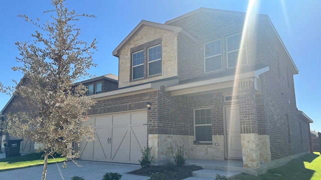 view of front of home with a garage