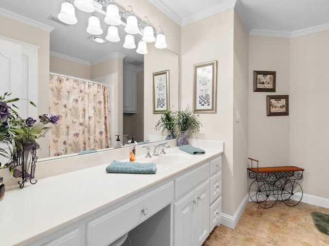 bathroom with vanity and ornamental molding