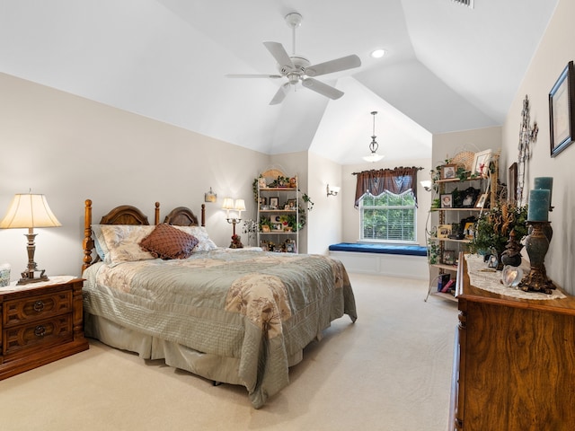 carpeted bedroom with vaulted ceiling and ceiling fan