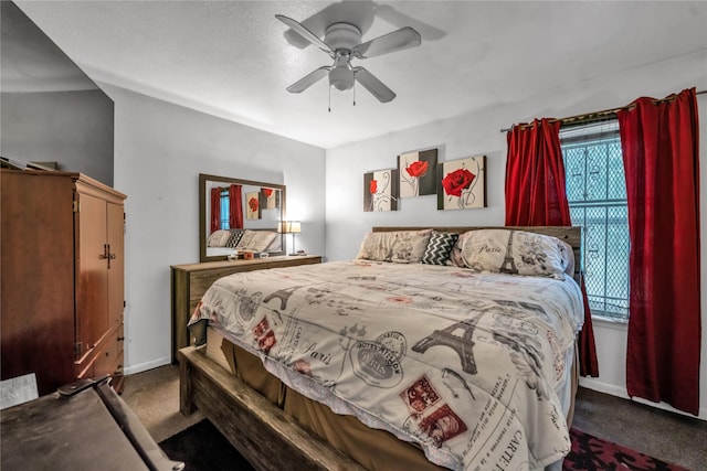 carpeted bedroom with ceiling fan