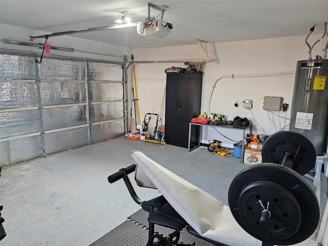 garage featuring a garage door opener and water heater