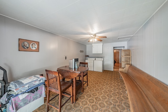 dining room featuring washing machine and clothes dryer and ceiling fan