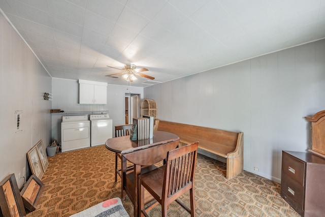 dining room with ceiling fan and separate washer and dryer