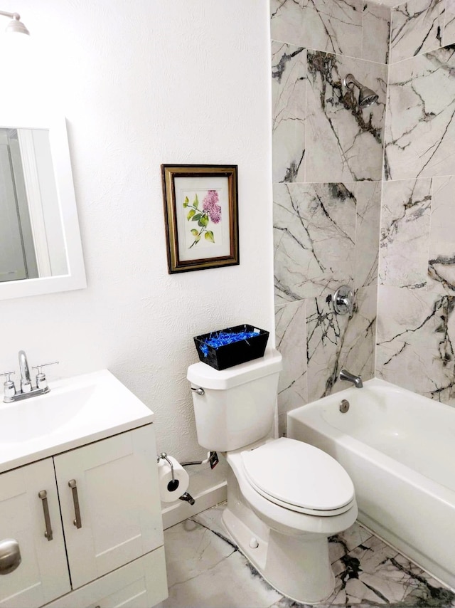 full bathroom with vanity, toilet, and tiled shower / bath combo