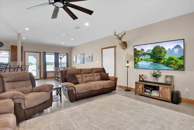 living room with baseboards, visible vents, ceiling fan, and recessed lighting