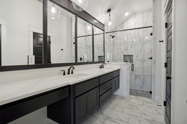 bathroom with tile patterned floors, a shower with door, vaulted ceiling, and double vanity