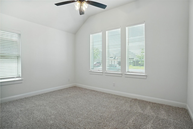 spare room with a healthy amount of sunlight, carpet floors, and ceiling fan