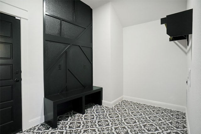 mudroom with tile patterned floors