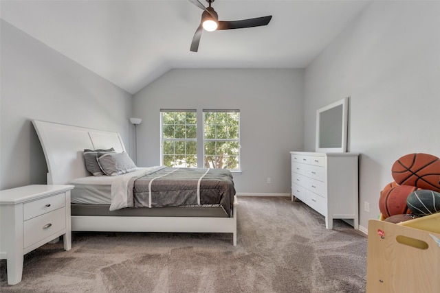 carpeted bedroom with ceiling fan and lofted ceiling