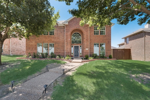 view of front of house featuring a front lawn