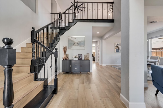 stairway featuring hardwood / wood-style flooring