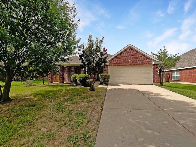 view of property hidden behind natural elements featuring a front yard and a garage