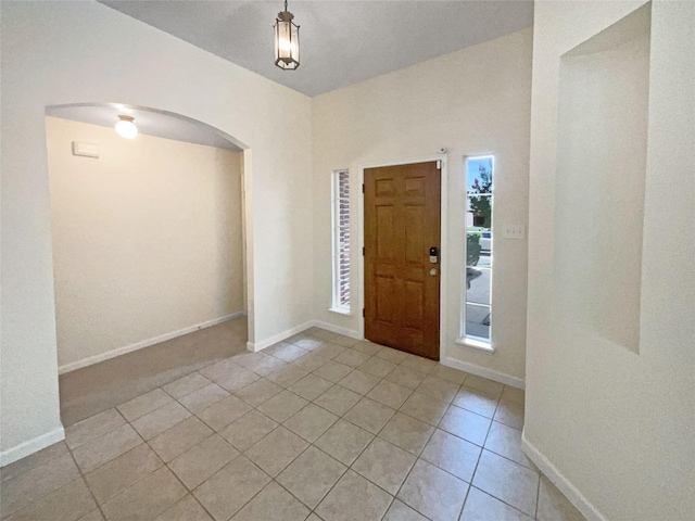 view of tiled foyer entrance