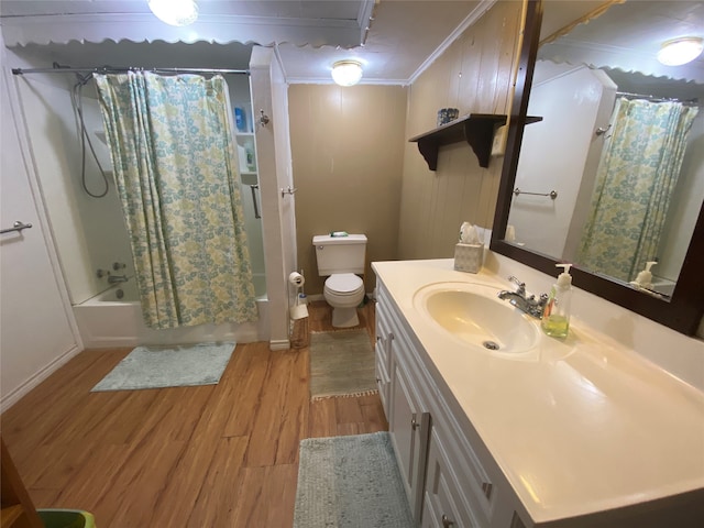 full bathroom with shower / bath combo, crown molding, toilet, vanity, and wood-type flooring