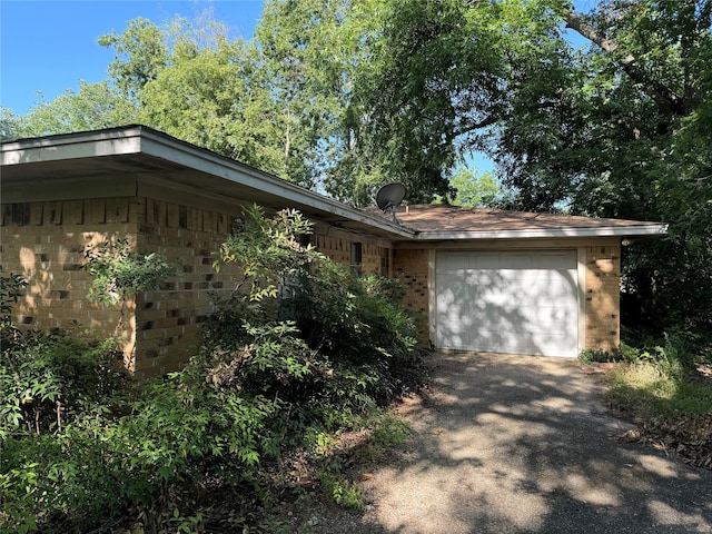 exterior space with a garage