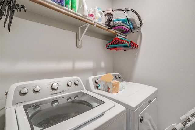 laundry area with washer and clothes dryer