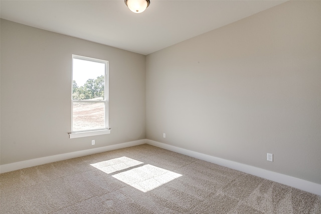 unfurnished room with carpet floors