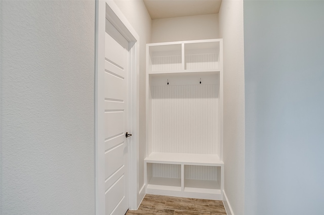 mudroom with hardwood / wood-style flooring