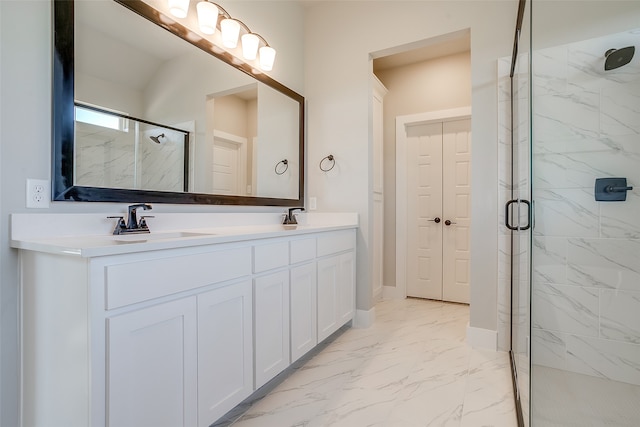 bathroom featuring vanity and a shower with door