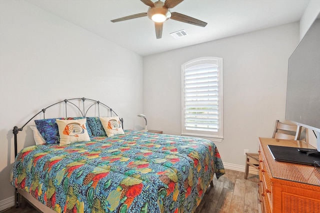 bedroom featuring wood-type flooring and ceiling fan