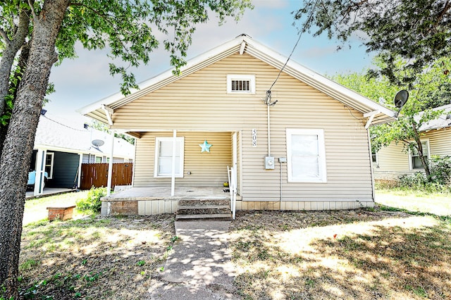 bungalow-style home featuring a patio area