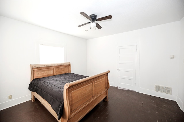 bedroom featuring ceiling fan and dark wood-type flooring