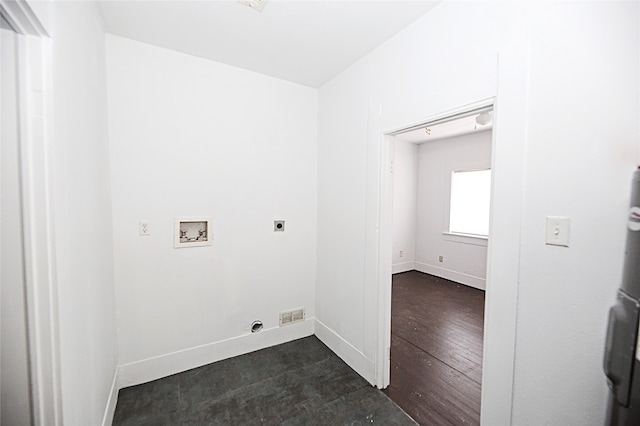 laundry room featuring dark hardwood / wood-style flooring, hookup for a washing machine, and hookup for an electric dryer