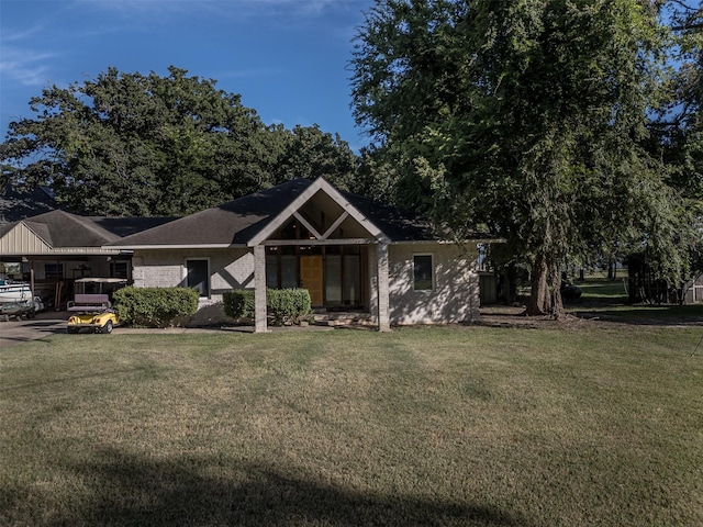 1457 Riverside Dr, West Tawakoni, TX 75474 - view of front of property with a front lawn