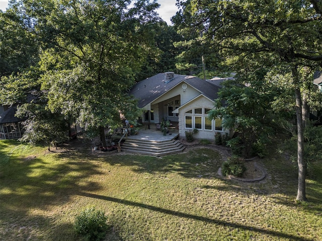 1457 Riverside Dr, West Tawakoni, TX 75474 - rear view of property featuring a deck and a yard