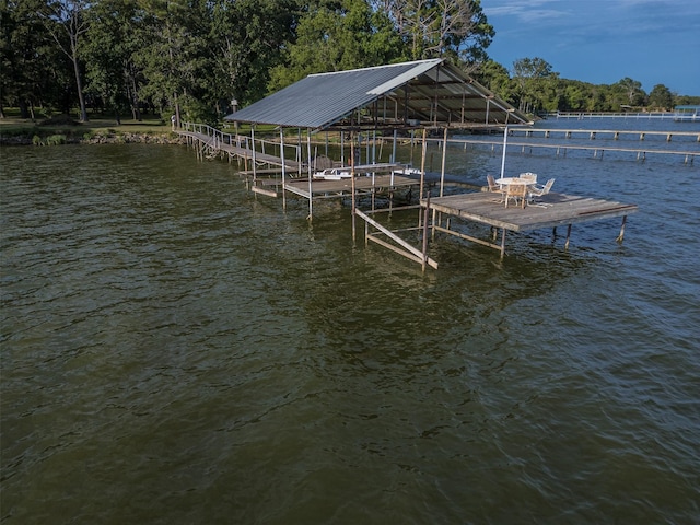 1457 Riverside Dr, West Tawakoni, TX 75474 - dock area featuring a water view and boat lift