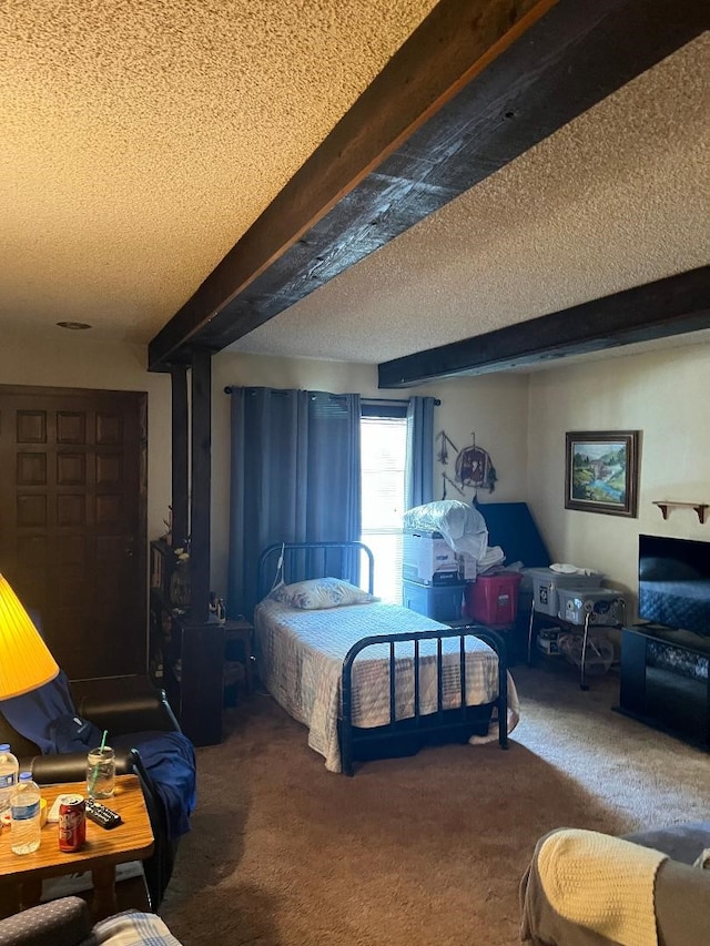 bedroom with carpet floors, a textured ceiling, and beam ceiling