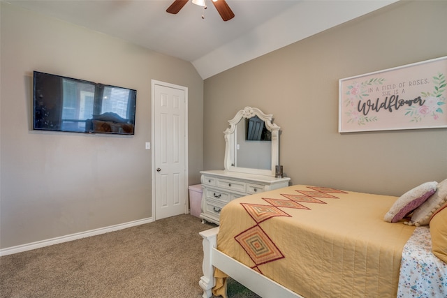 bedroom featuring carpet floors, ceiling fan, and vaulted ceiling