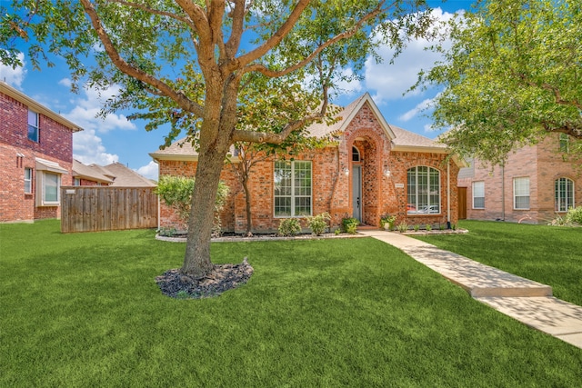 view of front of home with a front lawn