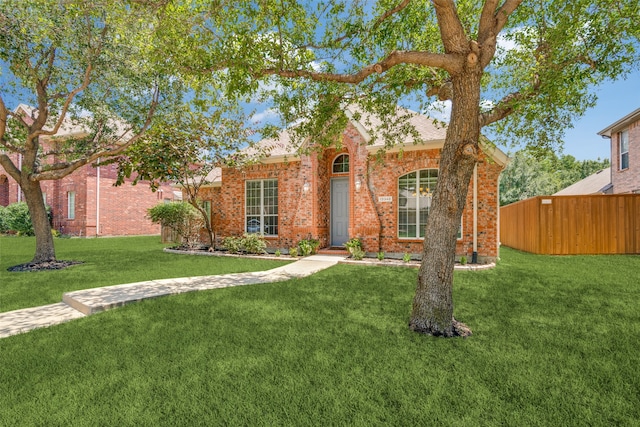 view of front of house with a front lawn