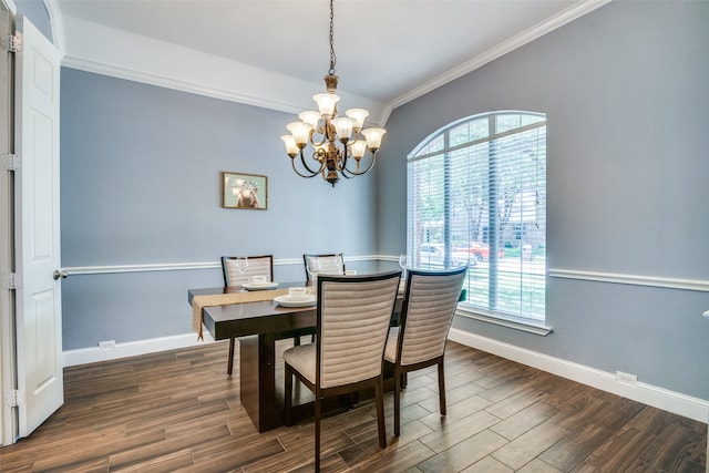 dining space with a notable chandelier, ornamental molding, and dark wood-type flooring