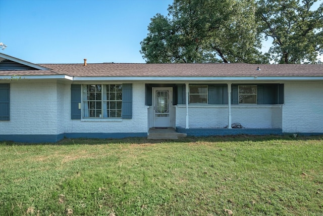 ranch-style house with a front yard