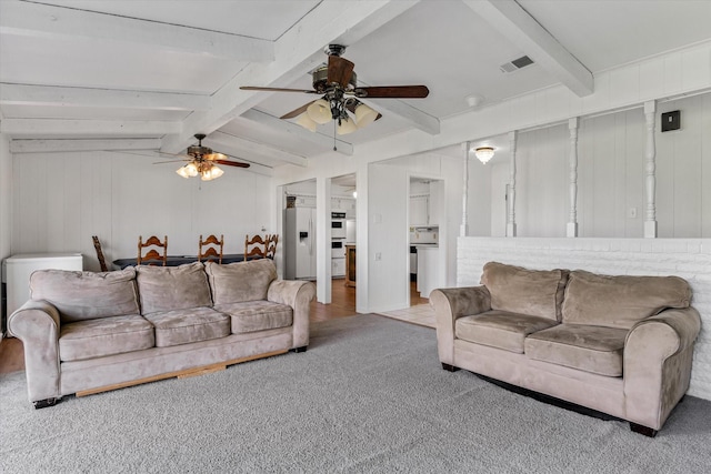 living room with light carpet, lofted ceiling with beams, and ceiling fan