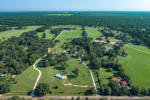 birds eye view of property featuring a rural view and a water view