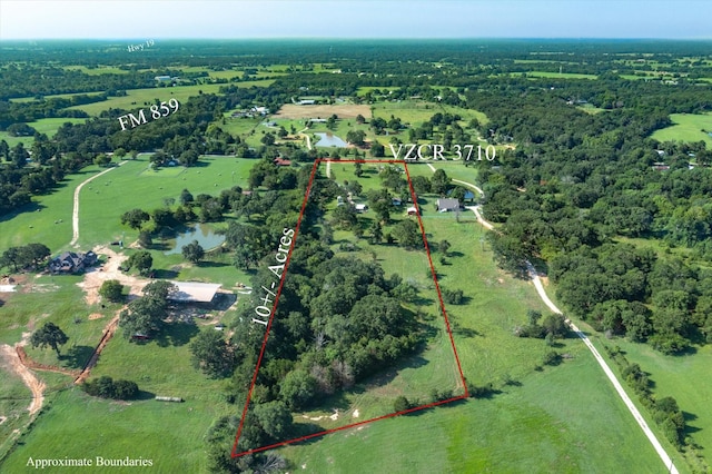 aerial view featuring a water view and a rural view