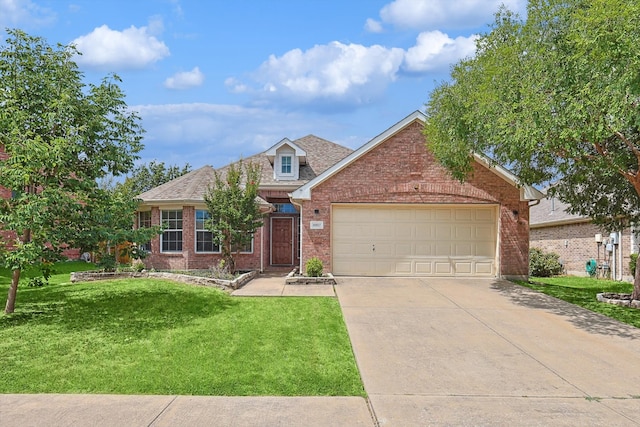 view of front of property with a garage and a front lawn