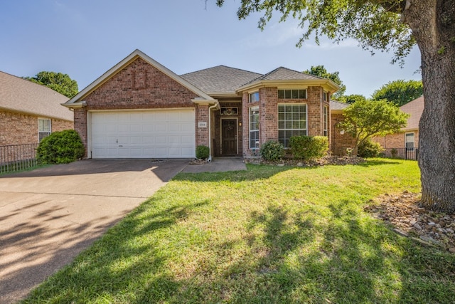 ranch-style house with a garage and a front lawn