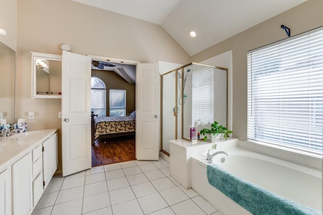 1514 Murphy Dr, Rockwall, TX 75087 - full bath with a shower stall, connected bathroom, vaulted ceiling, tile patterned floors, and a garden tub