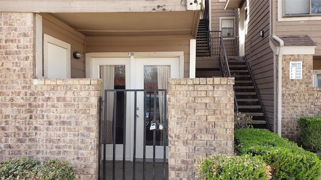 entrance to property featuring french doors