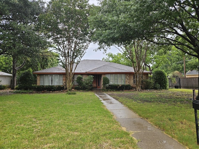 ranch-style house with a front yard