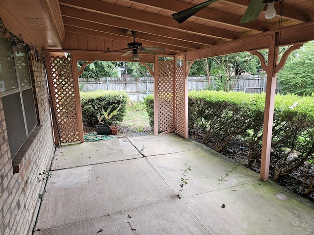 view of patio featuring ceiling fan